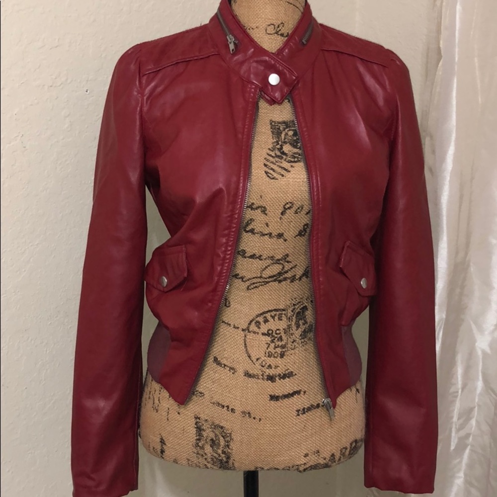 Small red leather jacket.